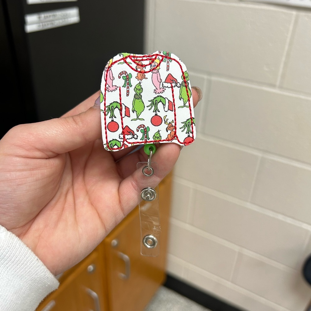 Christmas sweater grinch badge reel
